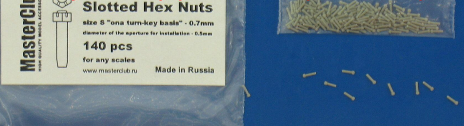 MC435082  корончатая гайка, размер под ключ - 0.7mm;  диаметр отверстия для монтажа-0.5mm;   140 шт.